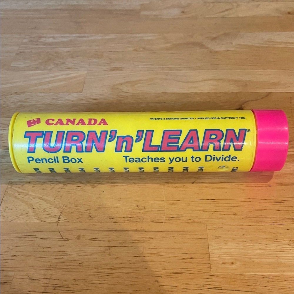 Asics Yellow and Pink Turn 'n' Learn Cylinder Combo Pencil Box and Math Tool